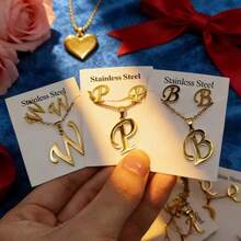 7件套不锈钢英文字母女士首饰套装，优雅简约混搭风格耳环项链套装，适合派对、婚礼、日常佩戴，时尚首饰，最佳礼物 - 隨機7組耳環項鍊套裝 - 查看 6