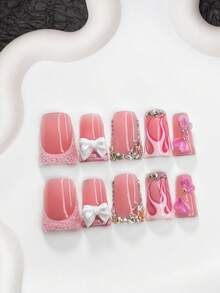 Bộ 10 móng tay acrylic kiểu Pháp ngọt ngào, móng giả acrylic, nơ trắng 3D dễ thương, trang trí móng hoa hồng gradient thủ công, thiết kế đá pha lê lấp lánh bất đối xứng, viền vàng hồng huyền ảo, phụ kiện làm móng phong cách sống động và đáng yêu, móng giả thủ công. - Nhiều màu - Xem 18