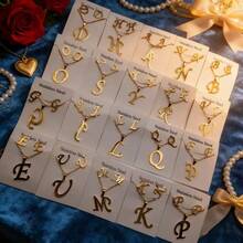 7件套不锈钢英文字母女士首饰套装，优雅简约混搭风格耳环项链套装，适合派对、婚礼、日常佩戴，时尚首饰，最佳礼物 - 隨機7組耳環項鍊套裝 - 查看 12