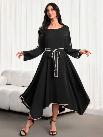 女士新款春夏杏色与黑色撞色V领连衣裙 – 不规则下摆、撞色腰带、A字长袍廓形、插肩袖设计、显瘦剪裁，休闲度假风与高端优雅风格