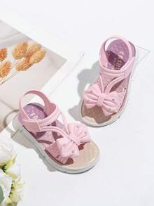 1 par de sandalias casuales de moda con lazo y strass para niñas, de suela blanda y antideslizante, con cierre de gancho y bucle, punta abierta y plana, ideales para el verano - Morado - Ver 1