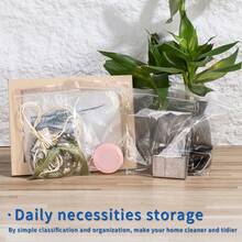 100个可重复密封透明塑料拉链袋，适用于各种物品，非常适合旅行、运输和储存，也适用于圣诞节和情人节，双层厚度0.064毫米/2.4密耳，透明珠宝包装袋、周年纪念生日透明包装袋、服装配饰收纳袋、多功能工具配件袋、节日礼品包装袋。 - 無色 - 查看 9