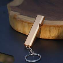 Crafted From Durable Metal, This Compact Golden Survival Whistle Features A Polished Finish That Provides A Reliable, High-Pitched Sound For Emergencies, Designed With A Convenient Keychain Attachment For Easy Portability And Immediate Access. - Gold - View 9