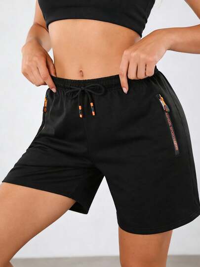 Pantalones cortos deportivos de cintura elástica para mujer, con bolsillo con cremallera con estampado de letras y cordón para gimnasio y verano, pantalones deportivos casuales negros