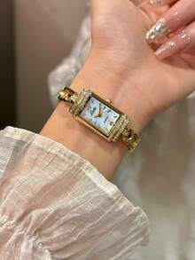 This Brand-New Gold French Retro-Style Brooch Women's Watch Exudes Understated Luxury. Adorned With Rhinestones, Its Stylish Simplicity Showcases Understated Elegance. Exquisitely Small And Waterproof, This Classic Quartz Timepiece Features A Delicate Mother-Of-Pearl Dial With Arabic Numeral Markers. Suitable For Everyday Wear, Evening Events, And Various Other Occasions, It Also Makes A Fitting Wrist Accessory, Or A Holiday Or Birthday Gift. - Gold - View 3