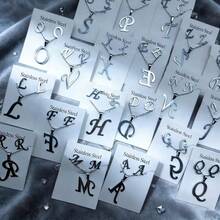 7件套不锈钢英文字母女士首饰套装，优雅简约混搭风格耳环项链套装，适合派对、婚礼、日常佩戴，时尚首饰，最佳礼物 - 隨機7組耳環項鍊套裝 - 查看 9