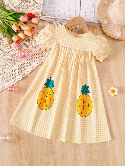 Vestido de verano de niña con mangas abullonadas y estampado de piña amarilla