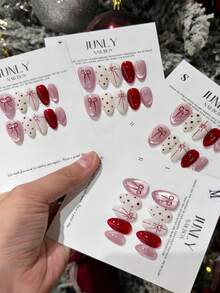 Bộ 10 móng giả dài hình hạnh nhân hiệu First-Order Joy, màu hồng và đỏ ngọt ngào, họa tiết nơ, chấm bi, đính đá lấp lánh, bề mặt bóng, móng giả thủ công tinh tế, nghệ thuật làm móng thanh lịch, phù hợp cho sử dụng hàng ngày, hẹn hò, các dịp lễ hội, hoàn hảo cho phụ nữ và các cô gái. - trắng - Xem 2