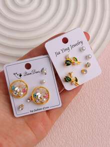 Bộ 9 khuyên tai đính ngọc trai giả tối giản thời trang hình nơ, hoa, trái tim, thích hợp cho bé gái đeo hàng ngày, có thể dùng làm trang sức, quà tặng, quà sinh nhật hoặc phụ kiện. - Bộ bông tai đính đá - Xem 7