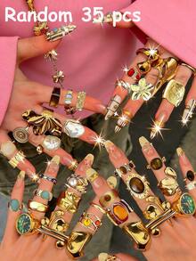 Bộ nhẫn thời trang cổ điển thanh lịch gồm 35 chiếc, kiểu dáng phóng đại, kích thước lớn, đính đá nhiều màu sắc, ngọc trai giả, đá mắt hổ, hoa, nơ, mặt trời, hình vuông, bán nguyệt, đường cong bất đối xứng, có thể điều chỉnh kích thước. Nhẫn rỗng kiểu trung cổ, có thể xếp chồng lên nhau, thích hợp cho phụ nữ, bạn bè, các dịp lễ hội, hẹn hò, đeo hàng ngày. Món quà lý tưởng cho Ngày Valentine, Ngày của Mẹ, Kỷ niệm (Kiểu dáng được giao ngẫu nhiên). - Nhiều màu - Xem 12