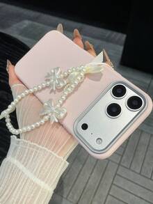 1个皮革质感纯粉色手机壳，可爱少女风，配有仿珍珠蝴蝶结和可拆卸挂绳，防震防滑防刮，兼容 17、17 Pro、17 Pro Max、17 Air、16、15、14、13、12、11、Pro、Pro Max、Plus、S20-S25/FE/Ultra、A56 5G等机型。 - 粉色 - 查看 4