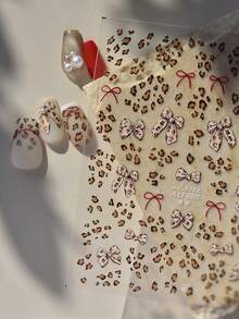 1个3D豹纹蝴蝶结美甲贴纸 迷人蝴蝶结美甲贴纸 滑动式冬季美甲装饰 美甲用品 - 彩色 - 查看 1