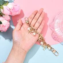 时尚仿珍珠蝴蝶结装饰金色链条吊坠包包配件 DIY 首饰配件，适用于手提包单肩包装饰 - 彩色 - 查看 3