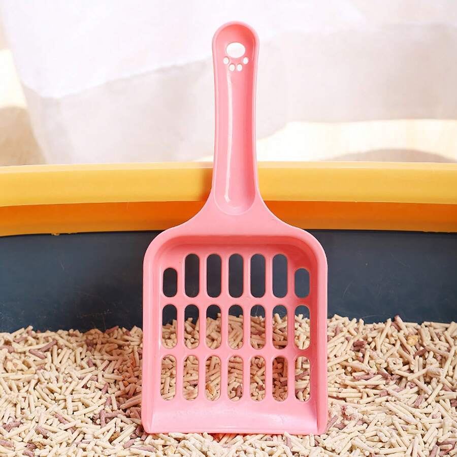 Cat Litter Scoop With Hollow Grid Design: Easy To Filter And Sift. Durable PP Plastic For Cat Waste In A Stylish Pink Color.