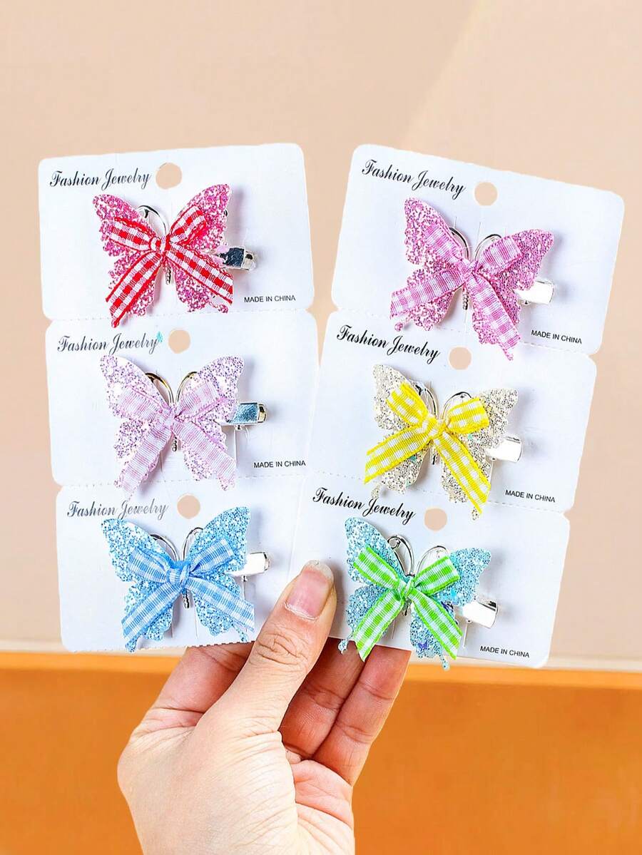 6个/套闪亮蝴蝶格子发夹，5种马卡龙色 - 红/粉/蓝/黄/绿，吸睛 - 适合女性和女孩，可为日常、校园、派对和假日装扮增添甜美活泼的气息。 - 彩色 - 查看 1