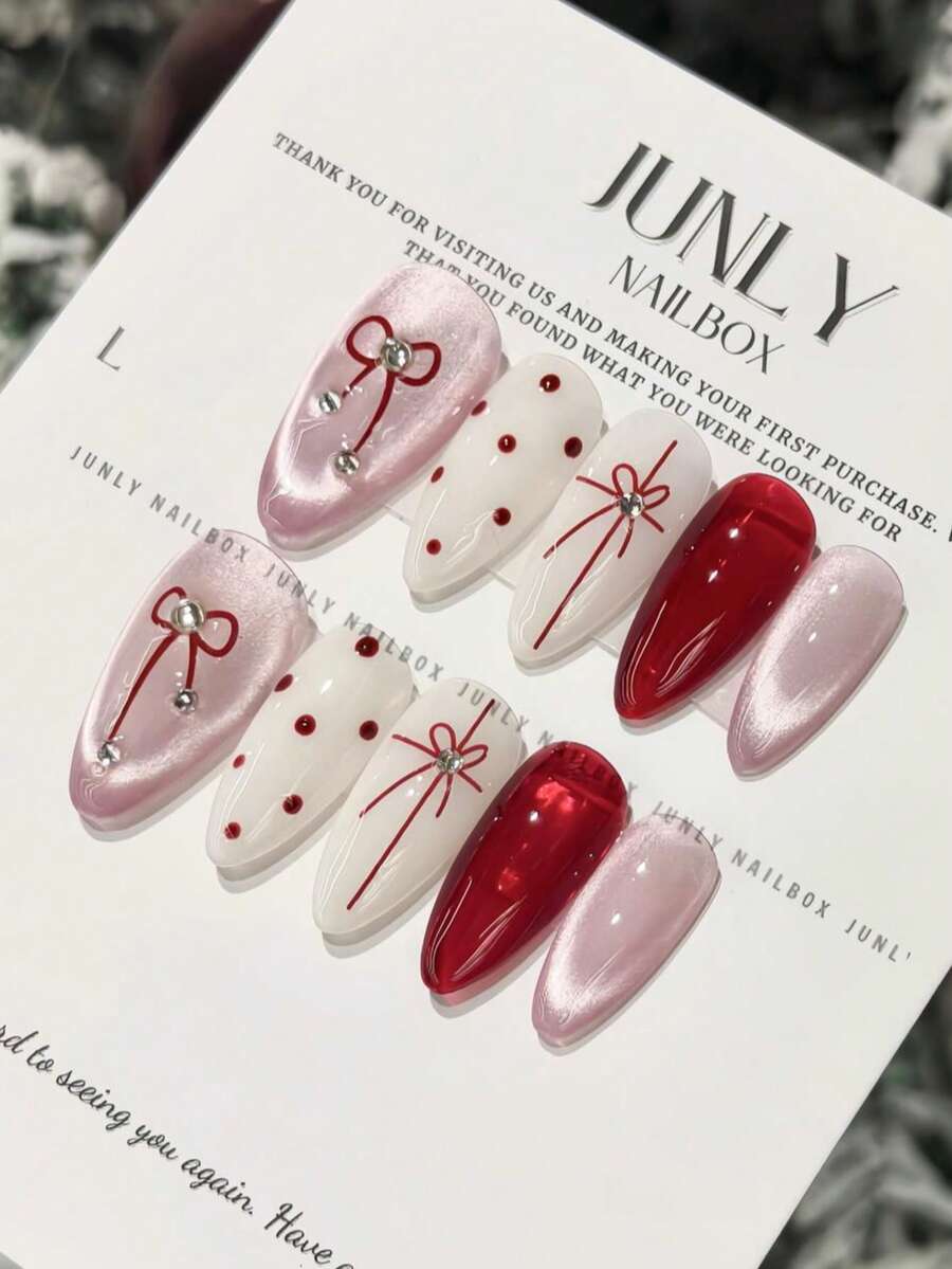 Bộ 10 móng giả dài hình hạnh nhân hiệu First-Order Joy, màu hồng và đỏ ngọt ngào, họa tiết nơ, chấm bi, đính đá lấp lánh, bề mặt bóng, móng giả thủ công tinh tế, nghệ thuật làm móng thanh lịch, phù hợp cho sử dụng hàng ngày, hẹn hò, các dịp lễ hội, hoàn hảo cho phụ nữ và các cô gái. - trắng - Xem 1