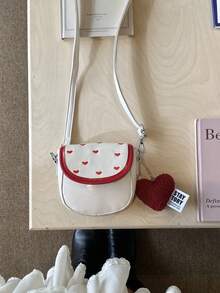 这款全新心形斜挎包休闲、简约又时尚。它采用翻盖设计，配有不可调节肩带，非常适合青少年、日常出行和旅行。小巧便携，轻松收纳日常必需品。这款百搭单品深受时尚人士喜爱，适合各种风格和场合，风格百搭。它也是馈赠亲友的绝佳礼物，尤其是在斋月期间。 - 愛心斜背包 - 查看 10