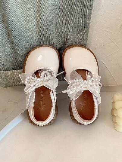 1 par de zapatos planos para bebé y niño pequeño con diseño de lazo y perla en color beige, suela suave y antideslizante, adecuados para primavera, verano, otoño e invierno
