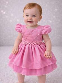Baby Girl Party Princess Dress Puff Sleeve Appliqued Pearl Layered Skirt Tulle Light Fabric Flared Luxury Elegant Marked Waist Sash Pearls Classic Model Charming Look Sophisticated Clothing Delicate Appearance Impeccable Finish Soft Touch High Quality Shine Comfortable Baby Clothing Ideal For Baptism Birthday Wedding Christmas New Year Ceremony Special Gift Photo Shoot Baby Princess Look Timeless Piece  Style Feminine Look Easy To Wear Careful Sewing Secure Closure Beautiful Modern Glamorous Children's Clothing Festive Look Stylish Girl Refined Appearance Highlight Important Occasion Commemorative Clothing Striking Presence Complete Look Charming Baby Piece That Transmits Sweetness And Sophistication Clothing That Shines And Enchant Mothers And Guests - 淺粉色 - 查看 1