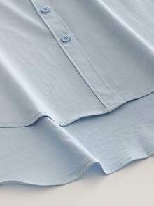 Minimalistyczny damski luźny sweter z klapami i długim rękawem, z kołnierzykiem koszulowym i asymetrycznym dołem