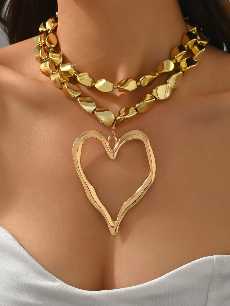 مجموعة من قلادتين مصنوعة يدويًا من سبائك معدنية ذهبية اللون بتصميم قلب مجوف مرصع بالخرز، تصميم مبالغ فيه وغير متماثل، قلادة نسائية فاخرة خفيفة الوزن مناسبة للارتداء اليومي والعطلات والحفلات - الذهبي - مشاهدة 1
