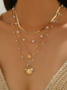4pcs/Set Fashionable Elegant Metal Chain Faux Pearl Layered Necklace With Shell & Starfish Pendant, Versatile Jewelry For Daily Wear And Music Festival Party, Chain Length Adjustable - Gold - View 1
