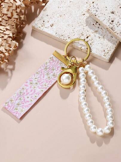 1pc Faux Pearl Keychain, Keyring, Bag Charm, Bag Accessory, Light Pink Woven Embroidered Jacquard Pattern Keychain (Note: The Woven Strap Cannot Be Hand-Held, But The Pearl Chain Is Elastic And Can Be Hand-Held), Elegant Ladies Bag Charm Keychain, Ladies Fashion Ribbon Keychain Keyring, Universal Keychain Keyring, Car Keychain, Ladies Fashion Keychain
