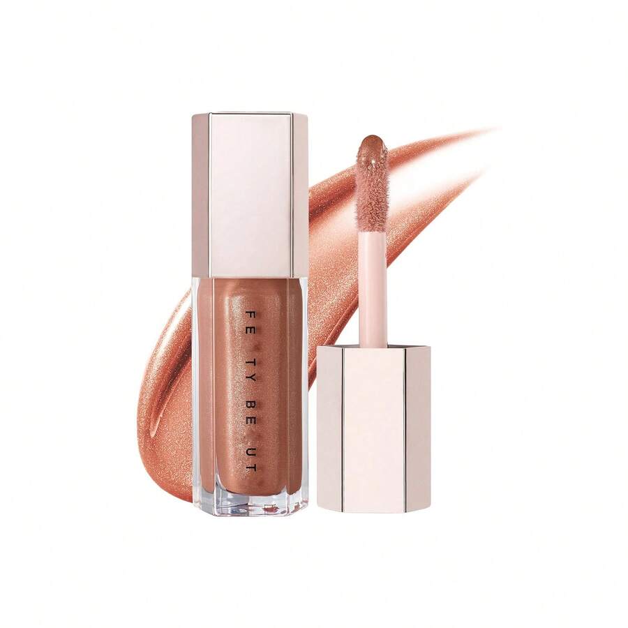 FB Multi-Purpose Lip Bomb, de la línea Fen ty Beau ty de Ri han na, incluye los tonos: Fenty Glow, Fu$$Y, Hot Chocolit y RiRi. Cada frasco de 9 ml (0.3 fl oz) crea un look de labios brillante. - Fenty Glow - Ver 1