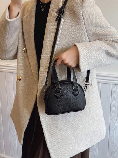 1个拉链时尚手提包，PU皮革外壳，适合女孩单肩斜挎包