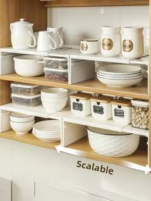 1 件装可伸缩厨房置物架 - 可调节设计，坚固塑料材质，无需工具，节省空间，适用于橱柜、台面、食品仓库 - 兼容双层置物架，是小型厨房的理想之选，外观现代简约，无需工具组装，便携小巧，易于清洁，是居家烹饪的必备品