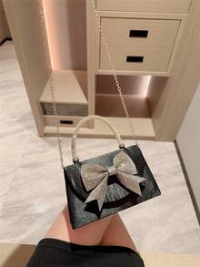 1 chiếc túi xách trang trí nơ đính đá lấp lánh sang trọng, thích hợp cho các bữa tiệc, dạ hội, sự kiện trang trọng, đám cưới. Hoàn hảo làm quà tặng Ngày Valentine cho phái nữ, phối cùng váy dạ hội, váy đính sequin và váy thanh lịch. - màu đen - Xem 8