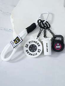 哑铃和杠铃钥匙扣套装,非常适合挂在背包上。创意健身配件包括哑铃、杠铃片、拳击手套和其他装饰吊坠。可DIY成钥匙扣和包包挂饰。 - 彩色 - 查看 9