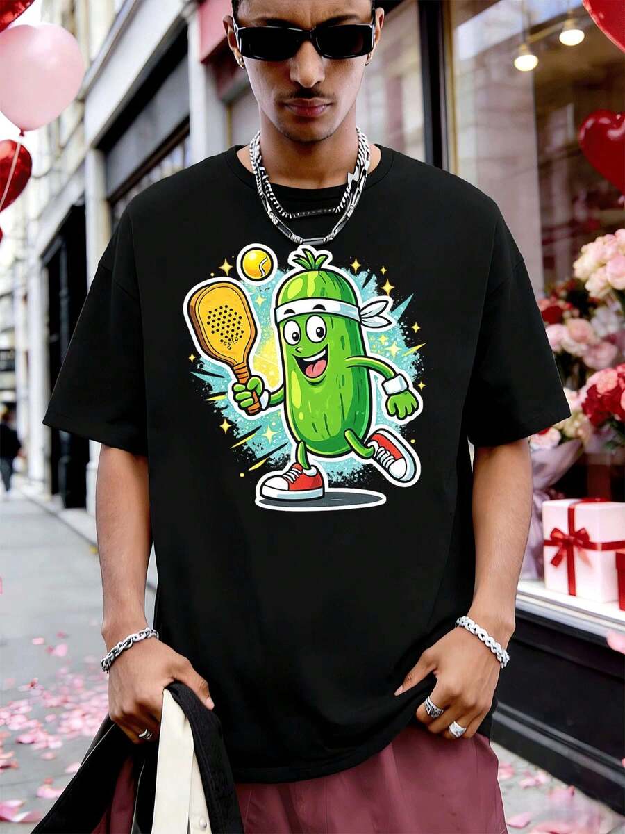 T-shirt humoristique avec un dessin de cornichon et un motif de tennis, confectionné dans un matériau de haute qualité, coupe ample, respirant, décontracté, avec un imprimé accrocheur. - Noir - Voir 1