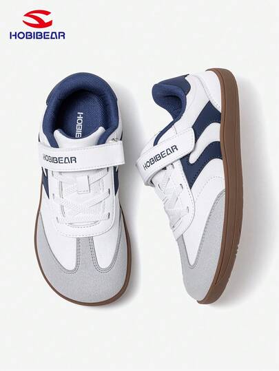  HOBIBEAR 儿童运动鞋，男女童通用，魔术贴宽楦设计，舒适透气平底鞋，简约橡胶鞋底，防滑耐磨，零落差网面赤足鞋，适合秋季穿着。