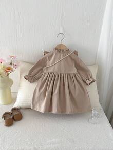 1 chiếc đầm dài tay cổ bẻ dáng rộng phong cách retro thường ngày dành cho bé gái, thích hợp mặc đi học. - Màu Khaki - Xem 4