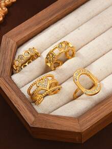 4件套不锈钢女士戒指套装，包含蜂窝和心形元素，适合日常、节日、约会、订婚、婚礼、外出、派对等场合搭配佩戴。 - 金色 - 查看 3