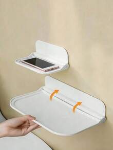 1 chiếc kệ treo bằng nhựa gấp gọn, thích hợp để đựng khăn tắm và quần áo trong phòng tắm tại nhà, cũng có thể dùng để trang trí phòng khách và văn phòng. Kệ để đồ cạnh giường, bảng gấp gắn tường, kệ đựng đồ trong phòng tắm và nhà vệ sinh, không cần khoan, thiết kế hai tầng có thể đựng điện thoại và các vật dụng nhỏ. - Nhiều màu - Xem 2