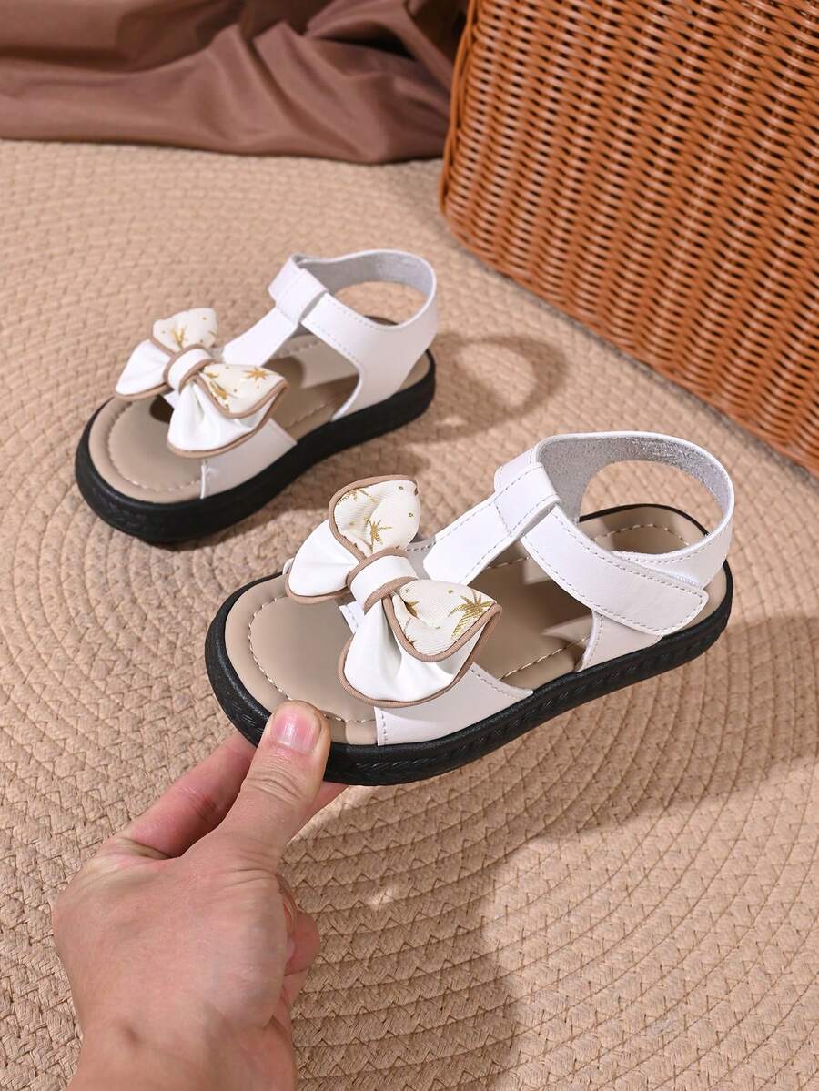 “女婴蝴蝶结星形印花凉鞋 – 可调节踝带，柔软鞋垫，防滑厚鞋底，可爱夏季婴儿鞋” - 白色 - 查看 1