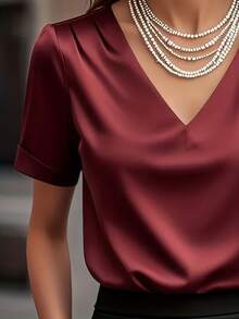 Camisa casual de mujer de manga corta de satén blanco elegante, blusa versátil y elegante para ir al trabajo. Blusa de cuello en V de unicolor de satén elegante, adecuada para todas las estaciones, lavable a máquina, no transparente, tela suave y transpirable. Textura de satén refinada, cintura con lazo de unicolor para la oficina y el uso diario en verano - Burdeos - Ver 5