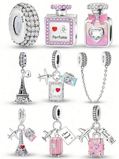 1 pingente banhado a prata com avião, câmera, torre e frasco de perfume, ideal para confecção de pulseiras e bijuterias femininas.