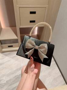 1 chiếc túi xách trang trí nơ đính đá lấp lánh sang trọng, thích hợp cho các bữa tiệc, dạ hội, sự kiện trang trọng, đám cưới. Hoàn hảo làm quà tặng Ngày Valentine cho phái nữ, phối cùng váy dạ hội, váy đính sequin và váy thanh lịch. - màu đen - Xem 1