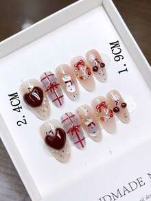 纯手工制作的中椭圆形美甲贴片，手工绘制的红色新年猫眼法式美甲，采用优质材料和简约设计，全覆盖式假指甲，千禧年风格美甲贴片，浮雕美甲，独特小众的创意假指甲，日常美甲，可爱现代风格美甲，适合日常佩戴，也适合秋冬季节，可拆卸佩戴，可重复使用。美甲用品 - 彩色 - 查看 4