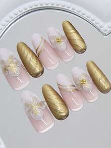 30片长杏仁形3D立体美甲贴纸，适合制作花朵法式美甲贴片。贴纸饰有精致闪亮的金箔冰花条纹图案和斜角法式金粉设计，与亚克力假指甲套装完美搭配。这是一款适合女士和女孩日常工作、节日和派对的美甲产品套装。套装包含杏仁形假指甲。美甲用品。 - 彩色 - 查看 3