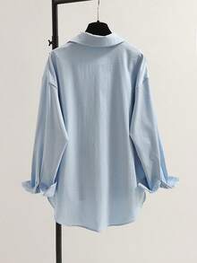 Minimalistyczny damski luźny sweter z klapami i długim rękawem, z kołnierzykiem koszulowym i asymetrycznym dołem