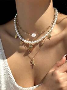 女士三件套珍珠、海星和贝壳叠层项链，优雅精致，适合休闲佩戴和夏季海滩装扮