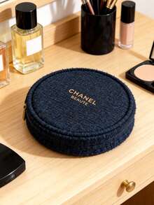 CHANEL Limited Edition Navy Blue Embossed Wool Round Cosmetic Bag, With Gold Logo And Camellia Zipper Pull, Luxury Makeup Pouch - Navy Blue - View 9