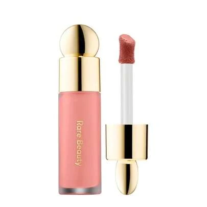 rare beauty mini soft pinch liquid blush (bliss)Este rubor líquido dura hasta 12 horas, creando un acabado fresco y duradero. Su fórmula hipoalergénica es suave con la piel. Su formato compacto de 3,2 ml facilita su aplicación en cualquier momento y lugar.