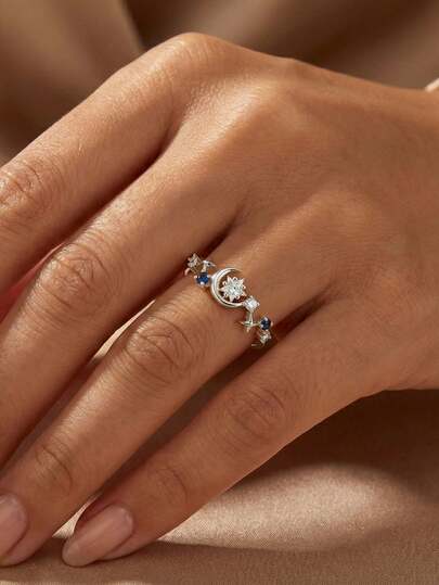 Anel requintado com decoração de estrela e lua em zircônia cúbica (1 peça), joia elegante para mulheres em festas, banquetes e uso diário. Feito de cobre, não desbota e é hipoalergênico. Presente ideal para as festas de fim de ano.