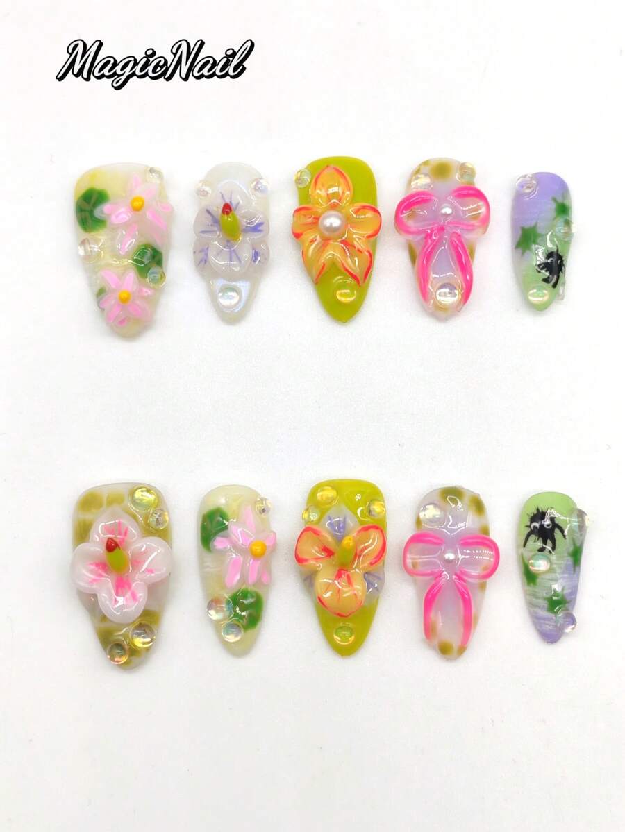 10片纯手工压制美甲贴片，25mm长杏仁形，米色底，青柠渐变水润底，立体凸起花朵，凸起蝴蝶结细绳粉色，手绘黑色细菌卡通图案，凸起圆点装饰。可爱美甲贴片，适合日常休闲度假，也可用于宴会、派对、演出等场合。美甲用品 - 彩色 - 查看 1