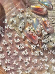 1 قطعة ملصقات فن الأظافر بتصميم زهرة بتلات بيضاء لامعة مرصعة بالراين ستون، ديكورات أظافر 5D أنيقة وشفافة، ملصقات لاصقة للمناكير والتزيين للنساء - متعدد الألوان - مشاهدة 4